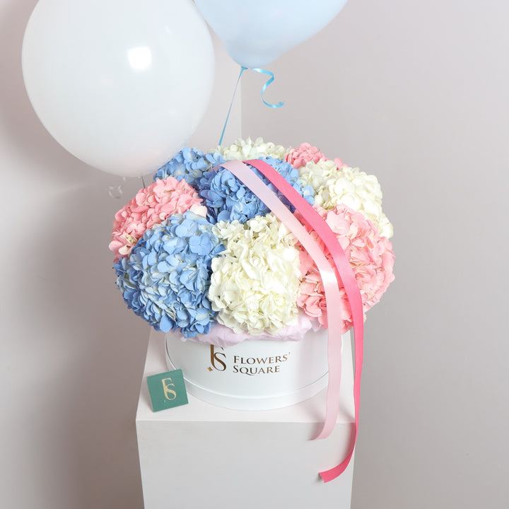 Plush hydrangea box with white balloons