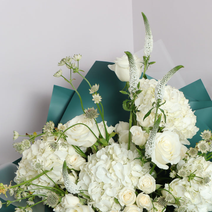 Flower box with white roses 