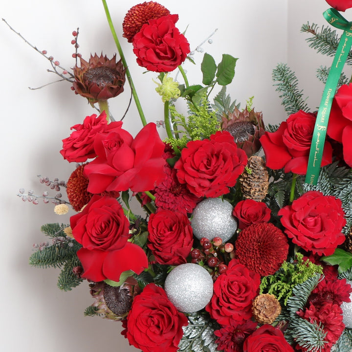 christmas present with red roses