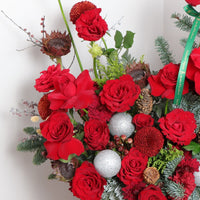 christmas present with red roses