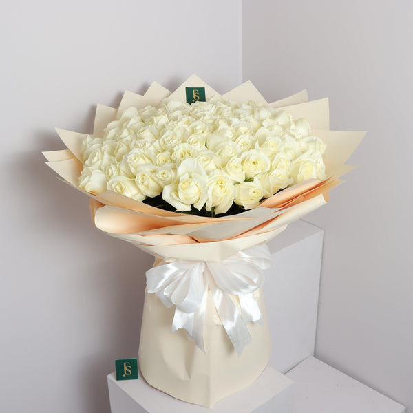 white roses bouquet price