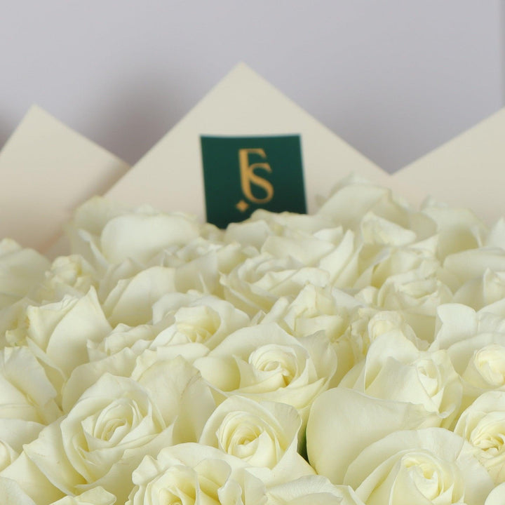 white roses bouquet price